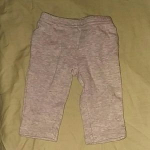 Gray pants with a ruffle on the butt